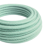 Câble textile rond en coton Lait menthe – rouleau en gros plan