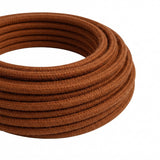 Câble textile rond en coton Marron cannelle – rouleau en gros plan