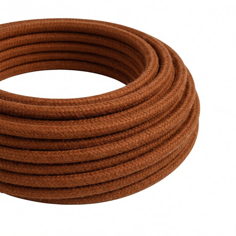 Câble textile rond en coton Marron cannelle – rouleau en gros plan
