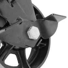 détail du frein d'une roulette de meuble en fonte et métal noir