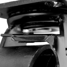 détail du frein d'une roulette de meuble vintage en métal noir