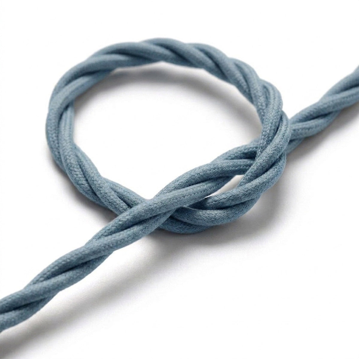 Gros plan du câble textile torsadé, coton bleu océan