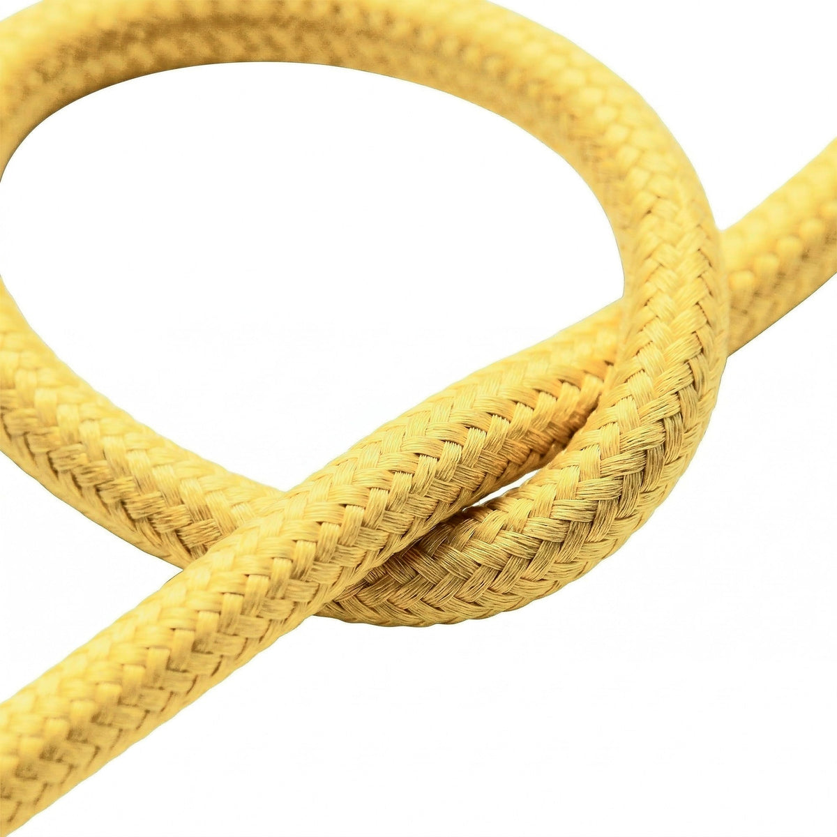 Gros plan du câble textile uni, effet soie jaune maïs
