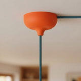 Rosace en silicone Ø 88 mm, trou central et sortie latérale — Orange